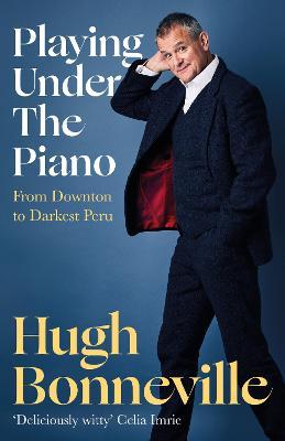 PLAYING UNDER THE PIANO
